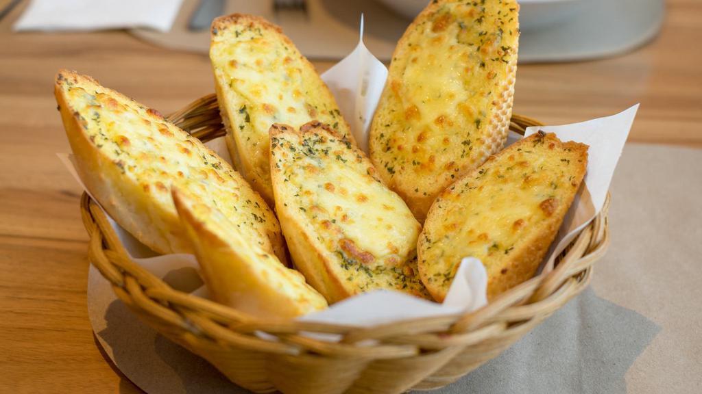 Garlic Bread · Oven-baked bread topped with hints of garlic.