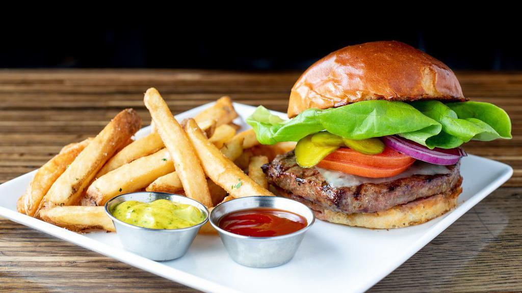 Certified Angus Beef Burger · 1/2lb Angus beef, tri-tip, and brisket • brioche bun • lettuce • tomato • pickle