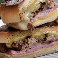 El Cubano Sandwich · Toasted Ciabatta | Roasted Pork | Ham | Monterey Jack | House Pickles | Mustard | Choice of ...