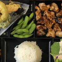 Lunch Bento A · Grilled chicken in teriyaki sauce ,Comes with miso soup, salad, rice, 2pc-gyoza,  edamame an...
