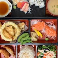 Deluxe Bento J · 8pc:Fresh salmon thin slice. Comes with miso soup, salad, white steam rice, 2pc gyoza, edama...