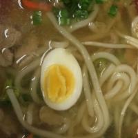 Chicken Udon · Thick wheat flour noodles with house broth, mixed vegetables, and egg.