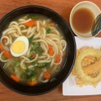 Tempura Udon · Thick wheat flour noodles with house broth, mixed vegetables, and egg. 1 pc shrimp & 4 pcs m...