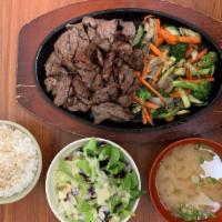 BBQ Beef · Charbroiled prime cut beef marinade in house BBQ sauce. Comes with miso soup, green salad an...