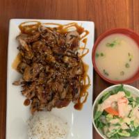 Chicken Teriyaki · Grilled chicken in a teriyaki sauce. Comes with miso soup, green salad and whit steam rice
