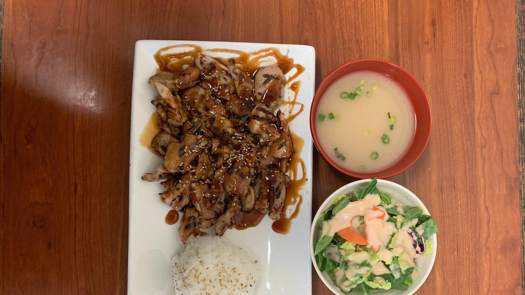 Chicken Teriyaki · Grilled chicken in a teriyaki sauce. Comes with miso soup, green salad and whit steam rice