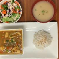 Chicken Curry · Chicken, mix vegetables with Japanese green curry sauce. Comes with miso soup, green salad a...