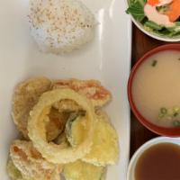 Mix Vegetable Tempura · 7pc mix vegetables battered and deep fried. Comes with miso soup, green salad and whit steam...