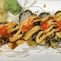Las Vegas Roll (10pc) · 10pc, fresh assorted fish, cream cheese topping with yellow & unagi sauce, and fish eggs.