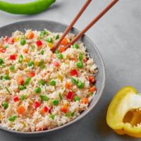 Veggie Fried Rice Dinner · Delicious stir-fried rice with fresh white and green onions, peas, finely chopped carrots, d...