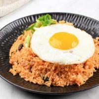 Egg Fried Rice · Classic fried rice decked with an egg.