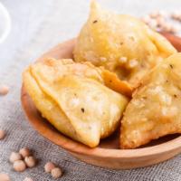 Samosas · Deep-fried and Delicious Hot Pockets filled with Fresh Potatoes and Peas.