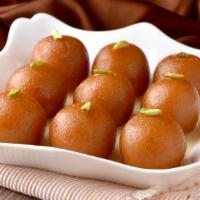 Lalmohan (Gulab Jamun) · Two deep fried pastries dipped in delicious sugar syrup.