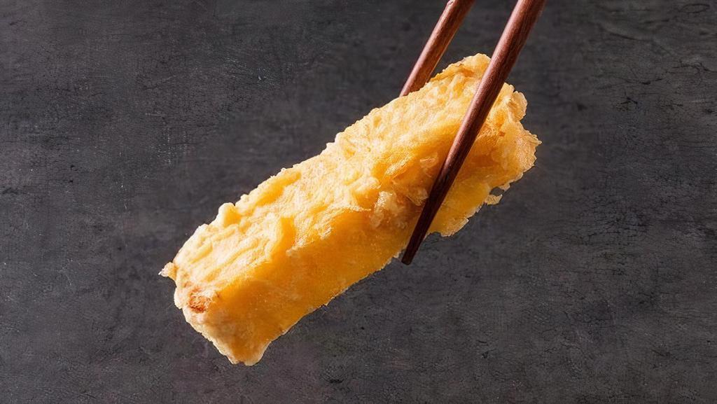 Tamagoyaki  · Crispy tempura fried egg done omelette style with a slightly sweet flavor and custardy texture