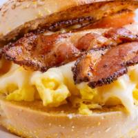 Turkey & Bacon Bagel Breakfast · Sliced Turkey and bacon strips mixed with scrambled eggs, and served on an everything bagel.