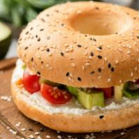 Avocado Bagel Breakfast · Vegetarian. Sliced Avocado, cream cheese and tomato, served on a toasted bagel.