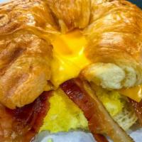 Breakfast Croissant · Eggs, American cheese and bacon on a butter croissant.
Substitute(sausage, ham, chicken or v...