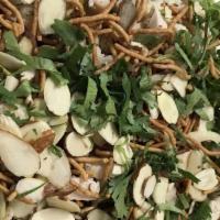 Asian Chicken Salad · Bed of romaine, Chicken breast, almonds, crispy noodles, cilantro & sesame seeds.