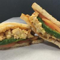 Santa Fe Chicken · Grilled chicken, melted jack, avocado, tomato and chipotle mayo on sliced sourdough toast.