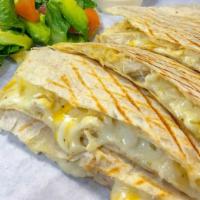 Carne Asada Quesadilla  · Melted Cheese, Carne asada  on  White flour  Tortilla (lettuce, Avocado, Sour cream, Salsa (...
