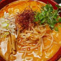 Spicy Miso Ramen · Creamy Chicken broth with Spicy Miso Base
Dish topped with Tokyo negi, bamboo shoot, bean sp...