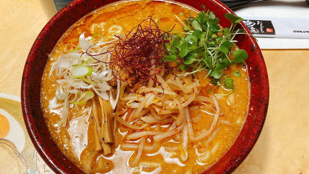Spicy Miso Ramen · Creamy Chicken broth with Spicy Miso Base
Dish topped with Tokyo negi, bamboo shoot, bean sprout, minced chicken meat and chili.