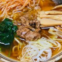 Vegan Shoyu Ramen · Vegan Broth
Topping :  Soy Meat, Spicy Moyashi, Bamboo Shoots, Spinach, Nori