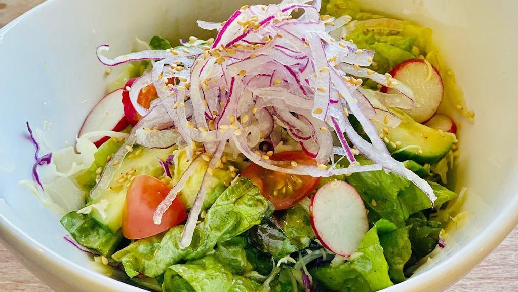 New! Green Salad with Sesame oil dressing · Green leaf, avocado, cucumber, radish, red onion, cherry tomato, cabbage with house made sesame oil base dressing.