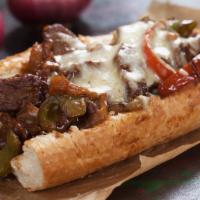 Spicy Philly Steak Sandwich · Spicy grilled steak, spicy peppers, chopped garlic, cilantro, grilled onions, melted provolo...