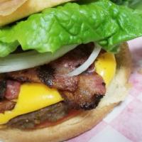 Gourmet Bacon Cheeseburger  · ON A BED OF FRIES.  Seasoned with our special spices. Beef Patty, Hickory Smoked Bacon, Gree...