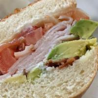 CA Turkey Sandwich · Turkey, bacon, avocado, lettuce, tomato and mayonnaise.
