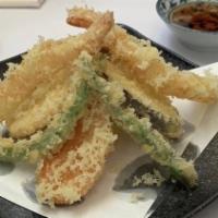 Tempura · Two prawn and assorted vegetables tempura.