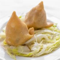 Veg Samosa · Pastry with potatoes and peas