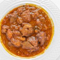 Lamb Curry · Lamb cooked with tomatoes and spices