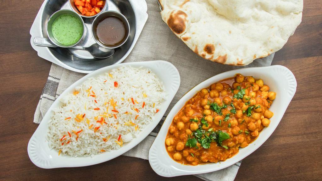 Chana Masala · Chickpeas cooked in a spice flavored sauce.