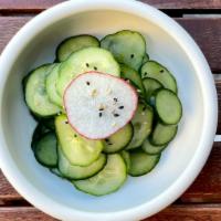 Cucumber Sunomono · Vegetarian. Cucumber salad with vinaigrette dressing and sesame seed.
