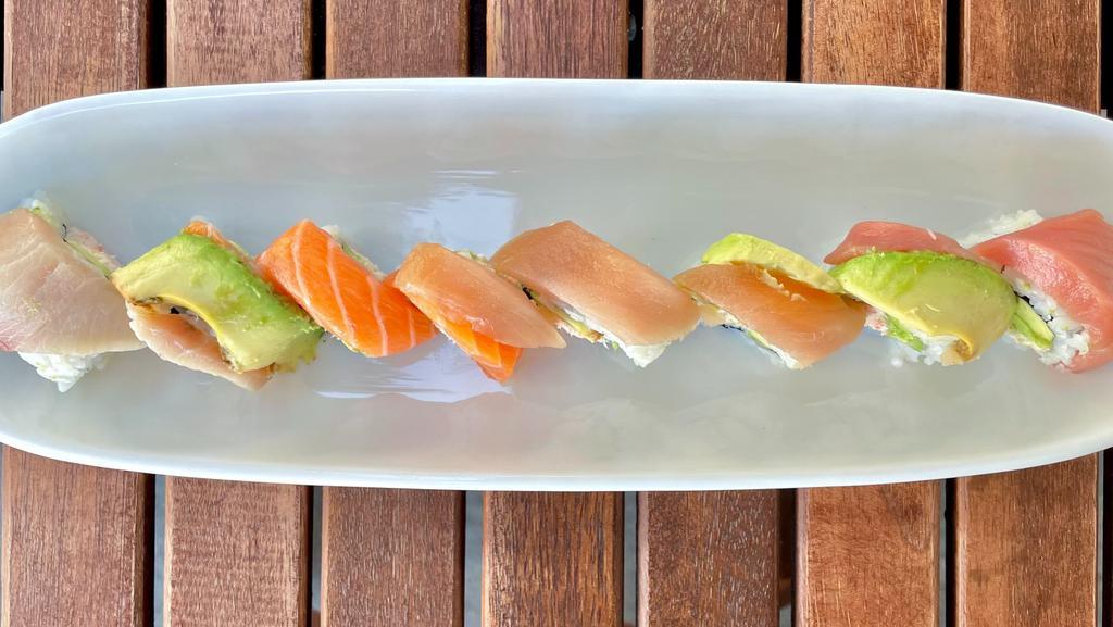 Castro · Crab and avocado roll topped with salmon, hamachi, maguro, and albacore or walu.
