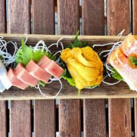 Market Sashimi (12pc w/ Uni) · 12 pieces of premium market fish with Uni.