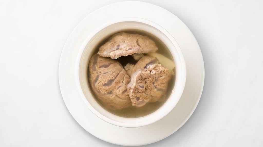 House Beef Soup (Steamed) · A light and delicious steamed beef broth with slices of bone-in short rib.