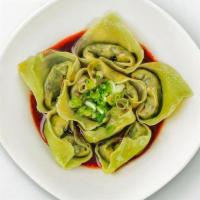 Vegan Wontons With Spicy Sauce · Served with our signature house spicy sauce and topped with garlic and green onion, our hand...