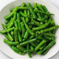 Sautéed String Beans With Garlic · Freshly-cut string beans, coated with minced garlic and tossed over high heat for a savory, ...