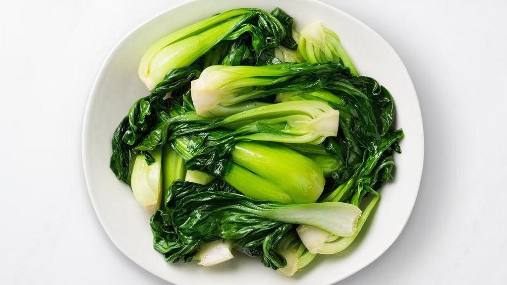 Sautéed Bok Choy · Our hand-selected bok choy is lightly stir-fried over high heat with our signature green onion oil. We time each step precisely to ensure the bok choy is cooked through while keeping its fresh, crisp texture.
