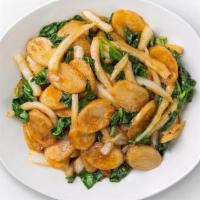 Vegan Shanghai Rice Cakes · Chewy rice ovalettes are sauteed with a healthy portion of crunchy cabbage, fresh spinach, a...