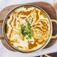Daal Makhani · Gluten Free. Whole black lentils simmered on low fire with red chili, ginger, garlic, tomato...