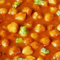 Chana Masala · Gluten Free and Vegan. Garbanzo beans cooked with onion and tomatoes. (Comes with Rice)