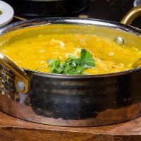 Tarka Daal · Gluten Free and Vegan. Combination of yellow and red lentils tempered with garlic, red chili...