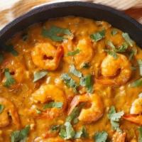Shrimp Curry · Gluten Free. Kerala style coconut curry tempered with mustard seeds and curry leaves. (Comes...