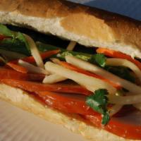Pork Belly Banh Mi · Baked pork belly with five spices & pate
carrot & daikon pickles, cucumber, cilantro & jalap...