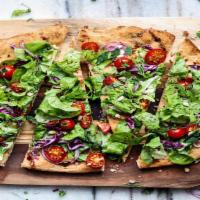Vegan Bountiful Salad Pizza · Vegan white pie with chopped romaine, red onion, diced tomato, avocado, and balsamic dressing.