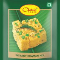 Khaman Dhokla · (14 oz.)  Savory cake made with a batter of gram flour and a leavening agent.